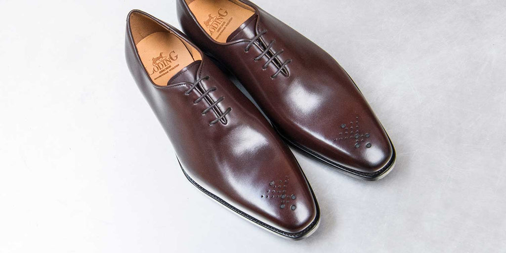 Chaussures homme à bout fleuri