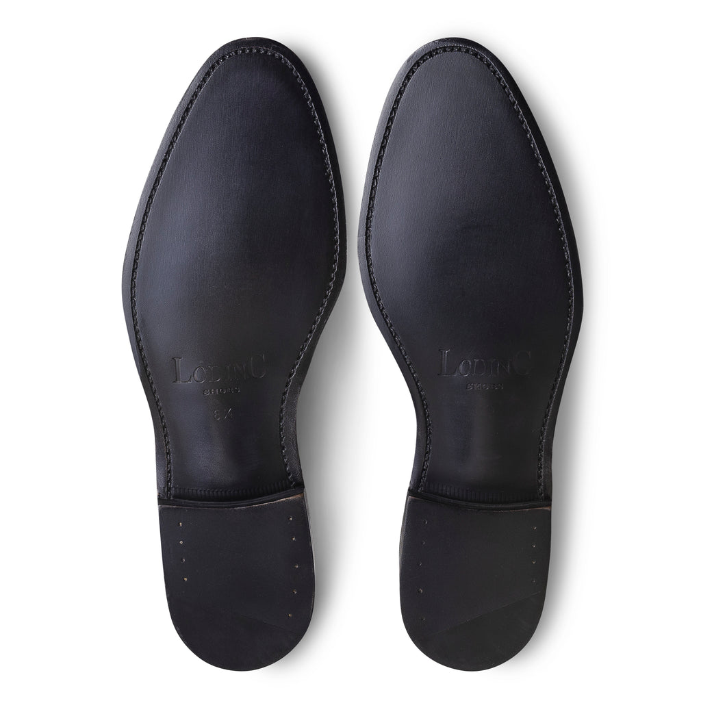 chaussures noires à semelle cuir pour homme