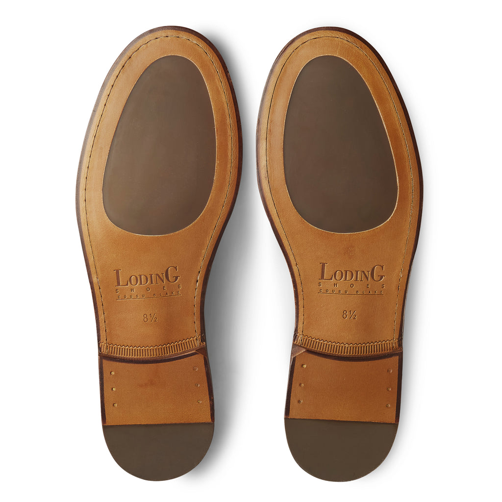 Semelle cuir avec patin gomme intégré pour ce mocassin d'été pour homme en veau velours beige